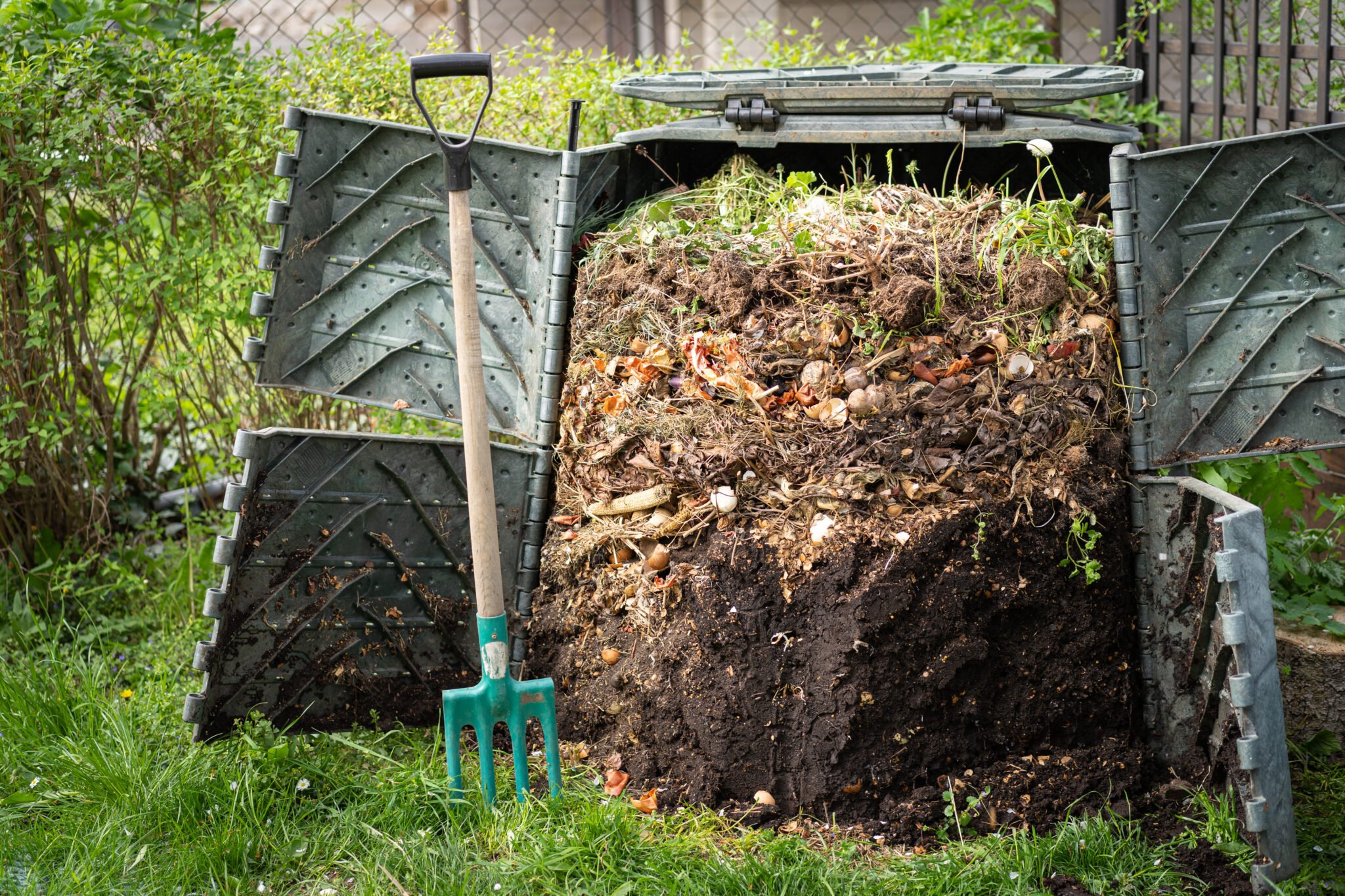 compost in plastic composter bin